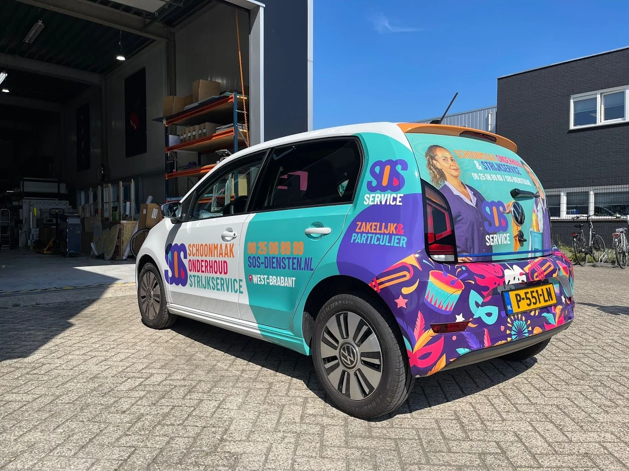 Volkswagen with colourful SOS Service car graphics.