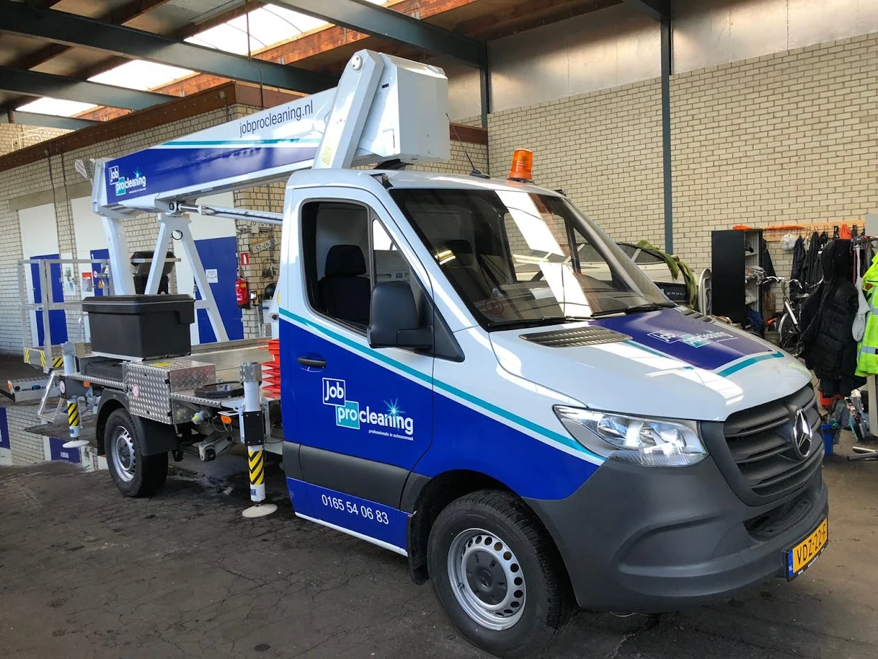 Job procleaning cherry picker with blue and turquoise brand graphics.