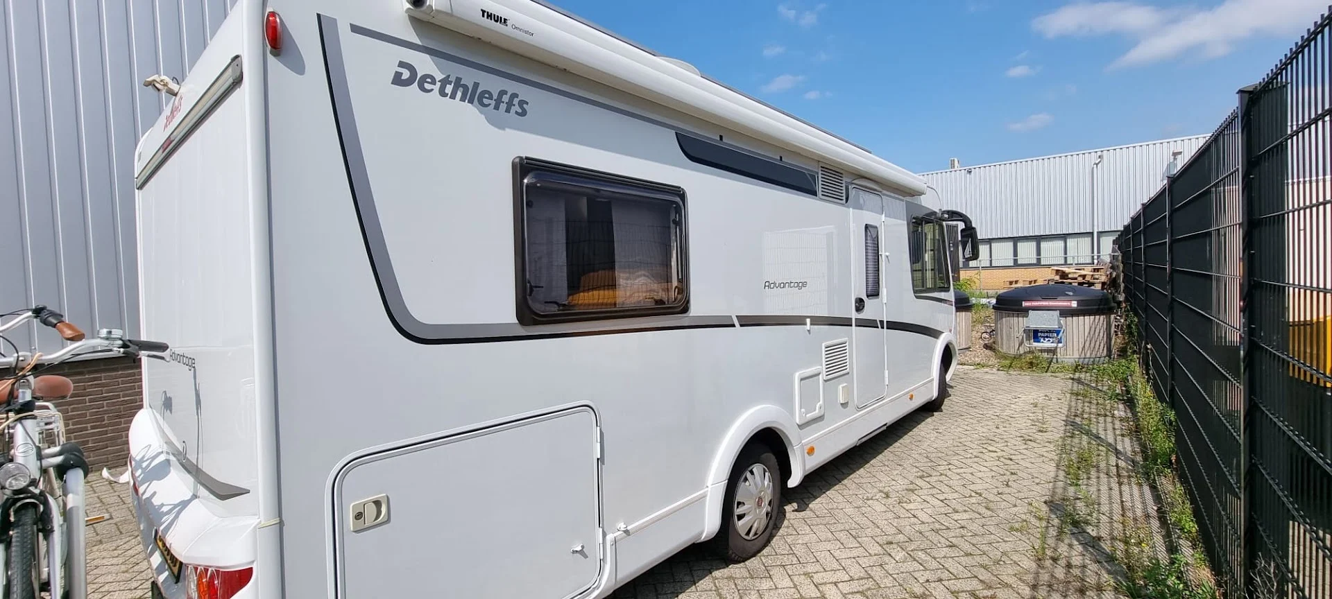 Dethleffs motorhome with black and grey stripes.