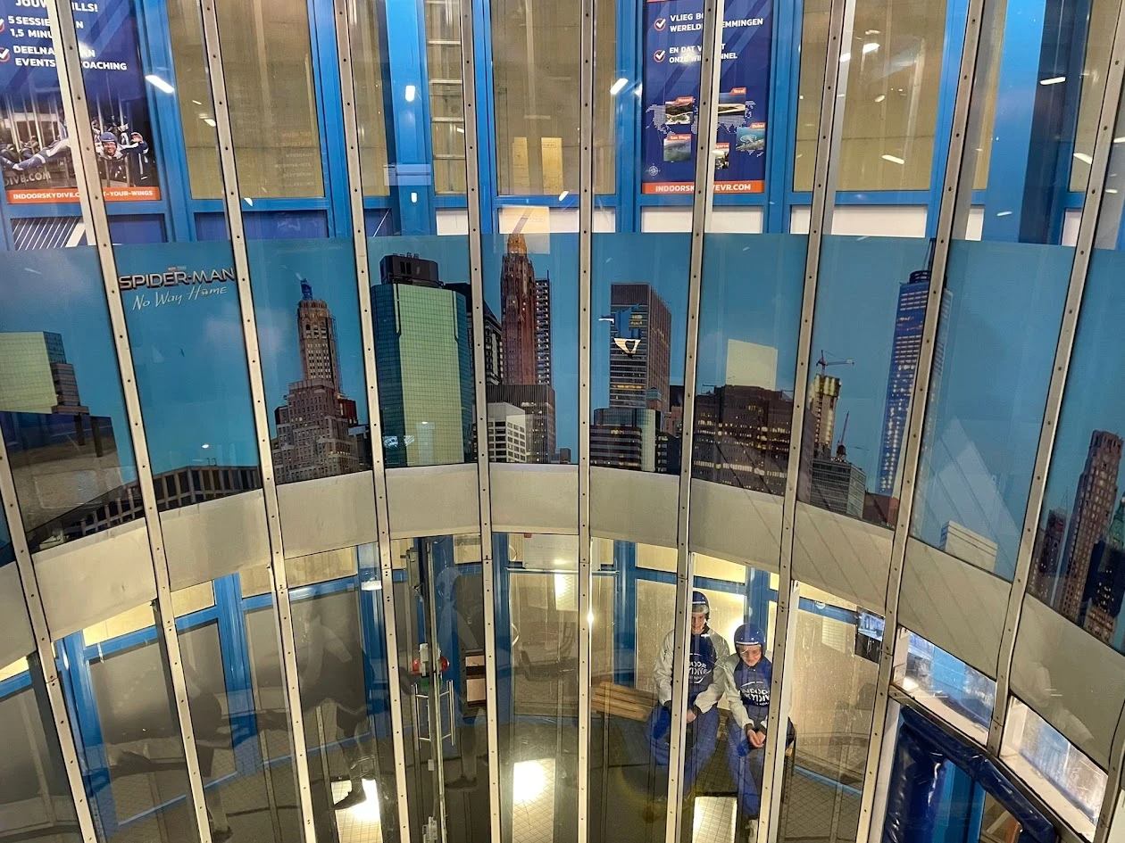 Curved glass partition with a printed skyline
