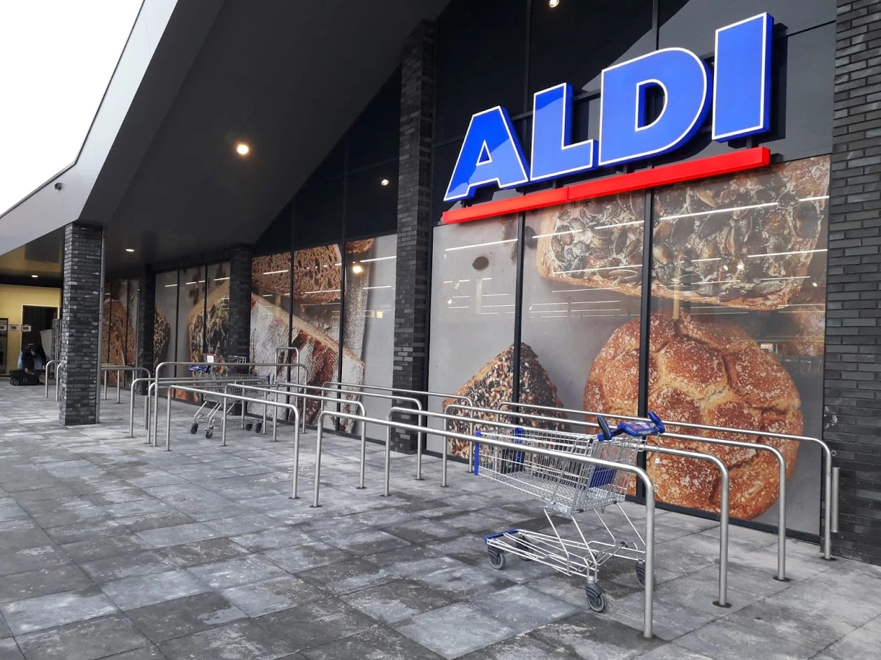 Supermarket facade with large bread-themed window prints