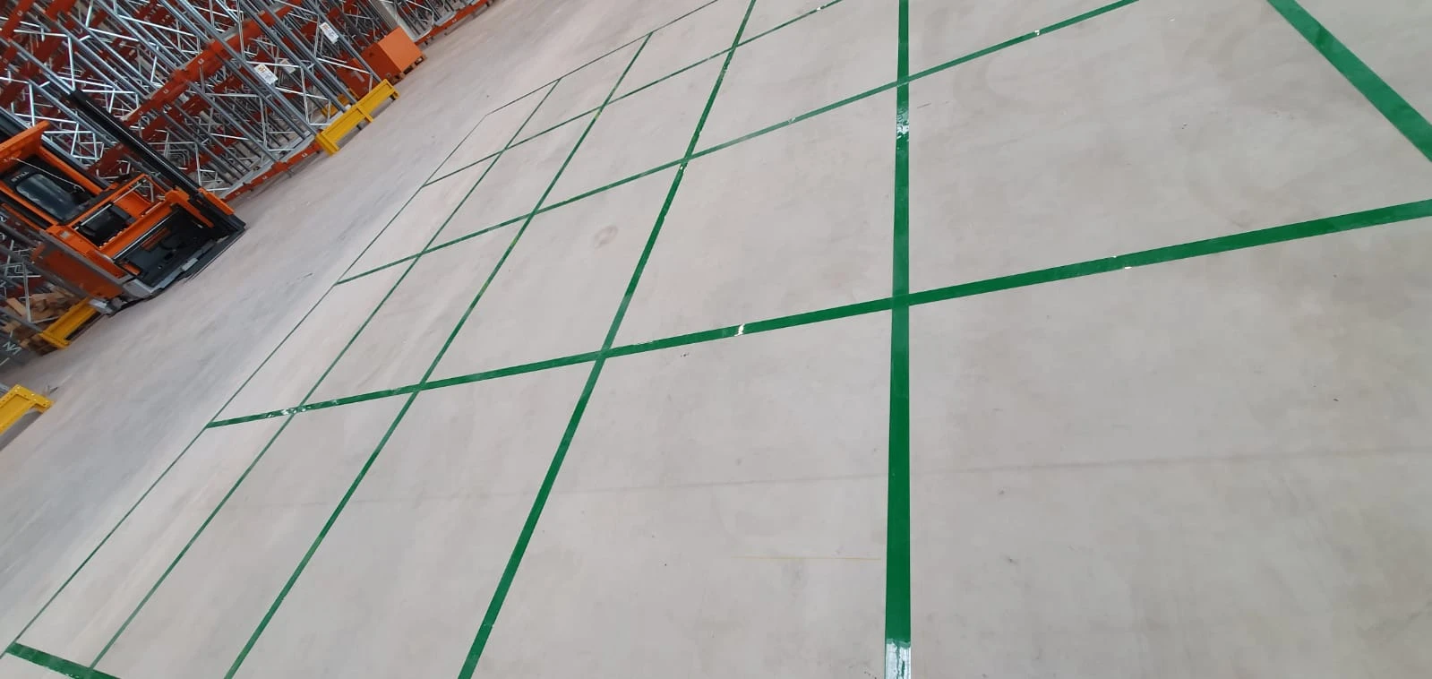 Detail of joints and intersections in green floor striping