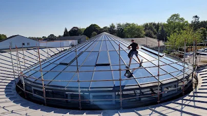 Film installation on a large glazed roof dome