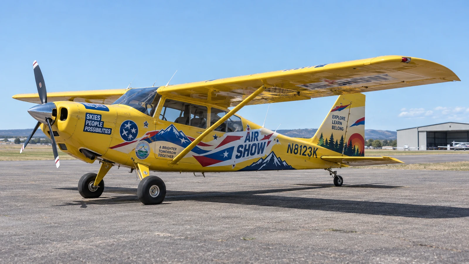 Yellow aircraft with striking promotional decals and campaign graphics
