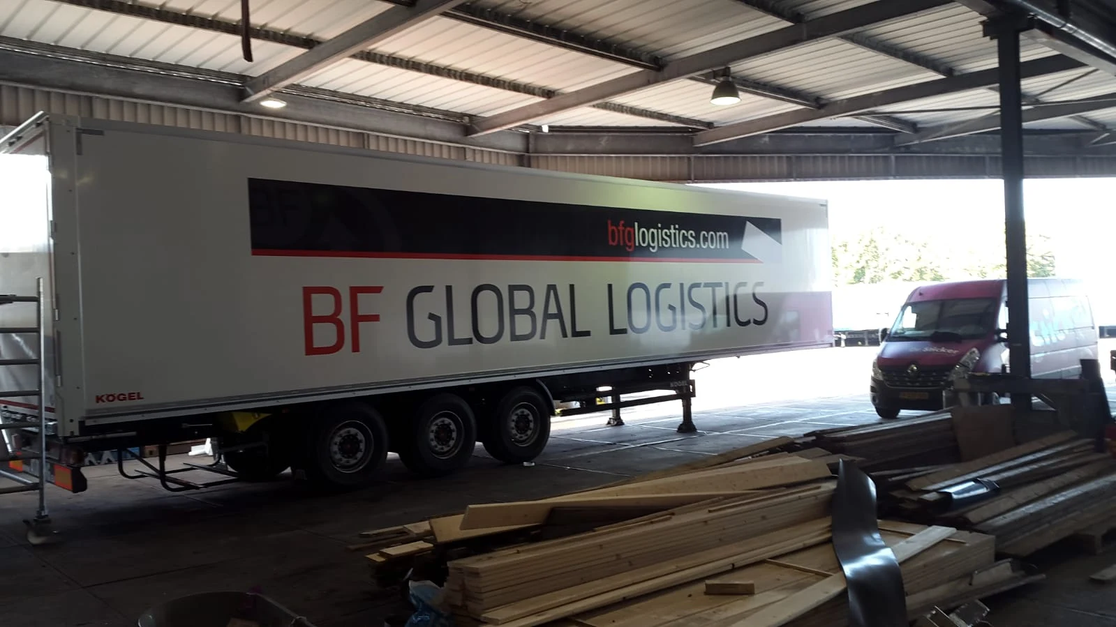 Semi-trailer with large BF Global Logistics lettering